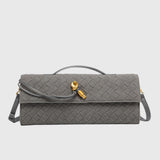 CHERRY™ – LUKSUS FLETTET SUEDE-CLUTCH